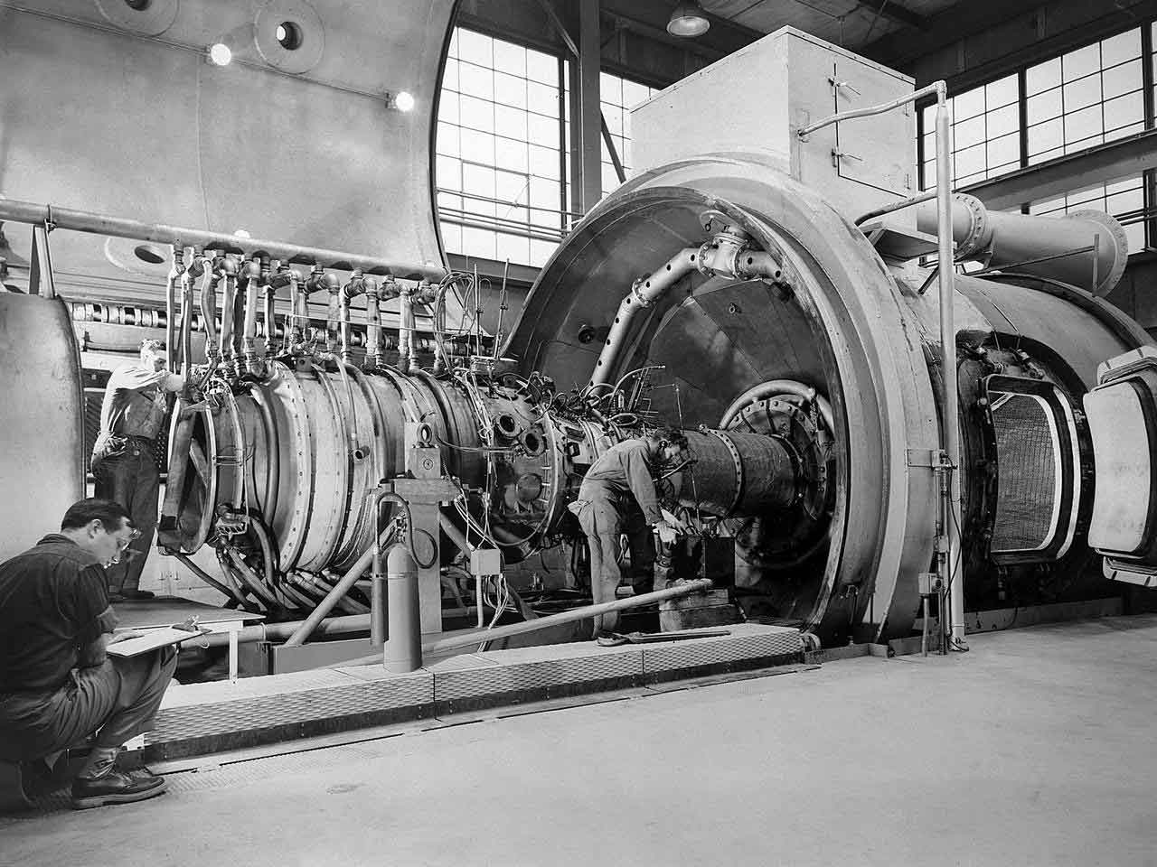 NASA engineer and technicians work of a rocket engine
