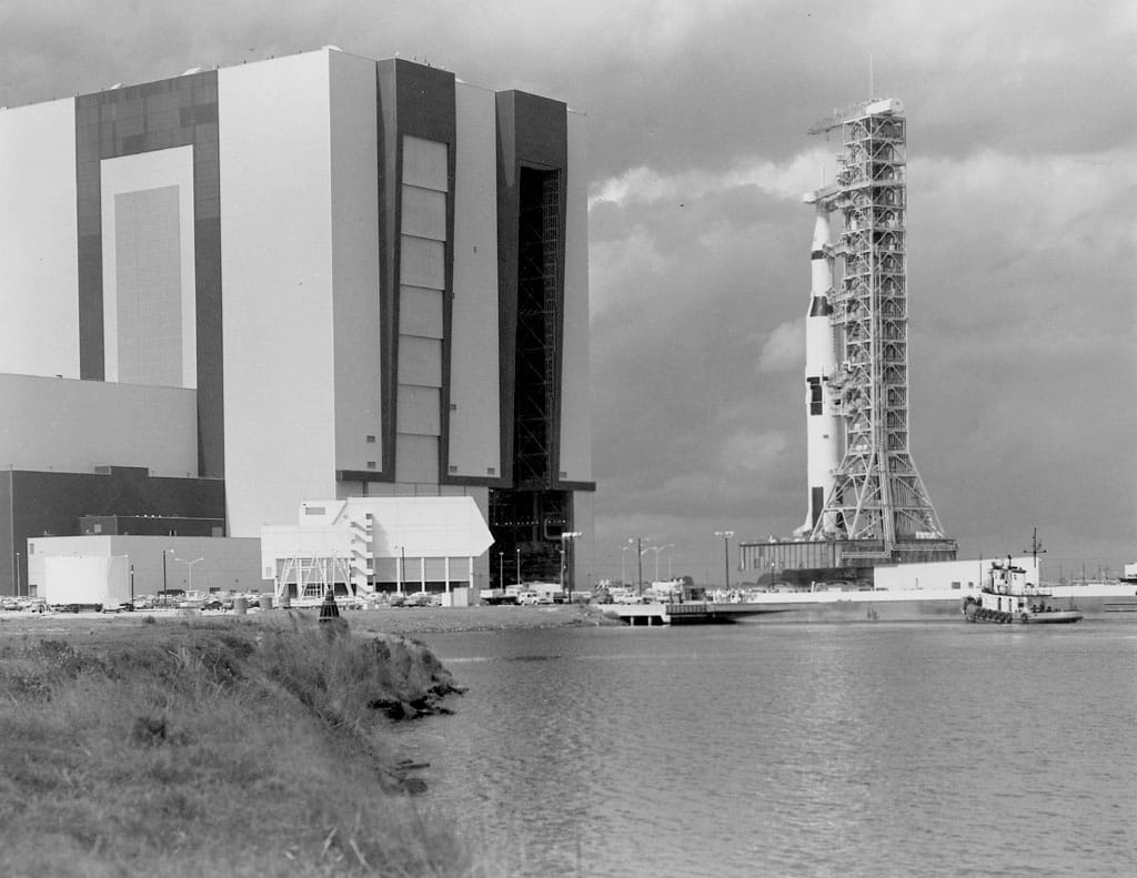 1960s NASA rocket on the launchpad near hanger.